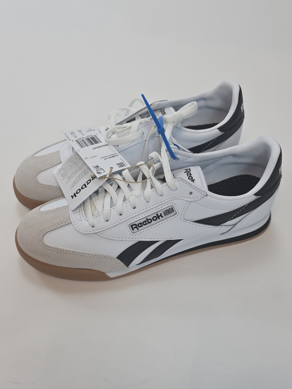 NWT Men's Reebok "CAMPIO XT" Tennis Shoes in color White/Black. Various Sizes